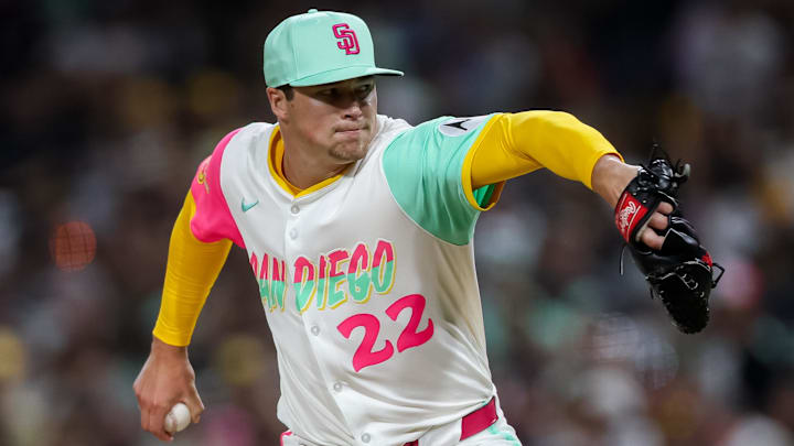 Aug 1, 2025; San Diego, California, USA; San Diego Padres pitcher Mason Miller (22) pitches during the eighth inning against the St. Louis Cardinals at Petco Park. Mandatory Credit: Chadd Cady-Imagn Images