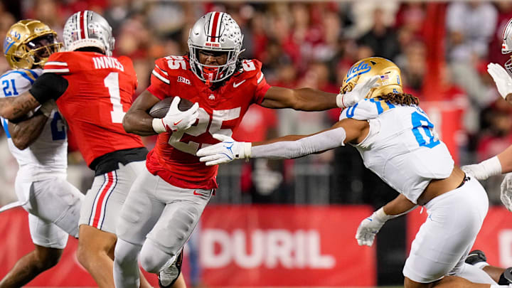 Ohio State Buckeyes running back Bo Jackson (25) stiff arms UCLA Bruins linebacker Donavyn Pellot (0) in the second half of the NCAA college football game at Ohio Stadium on Saturday, Nov. 15, 2025 in Columbus, Ohio.