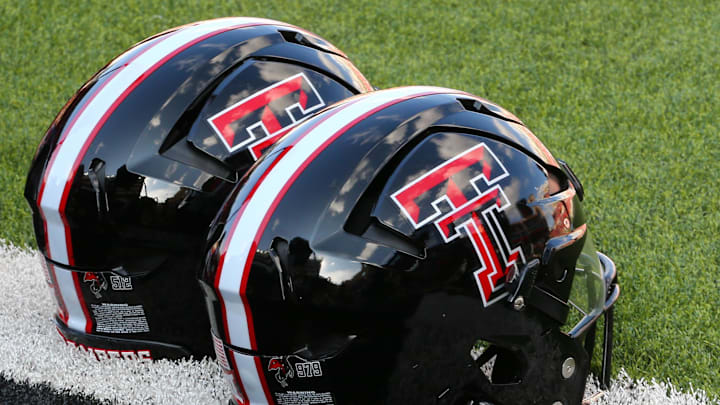 Sep 21, 2024; Lubbock, Texas, USA;  A general view of Texas Tech Red Raiders helmets on the turf before the game between the Arizona State Sun Devils and the Texas Tech Red Raiders at Jones AT&T Stadium and Cody Campbell Field. Mandatory Credit: Michael C. Johnson-Imagn Images