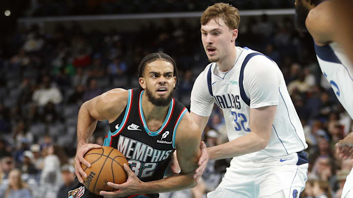 Mar 12, 2026; Memphis, Tennessee, USA; Memphis Grizzlies guard Rayan Rupert (32) drives to the basket as Dallas Mavericks forward Cooper Flagg (32) defends during the third quarter at FedExForum. Mandatory Credit: Petre Thomas-Imagn Images Mar 12, 2026; Memphis, Tennessee, USA; Memphis Grizzlies guard Rayan Rupert (32) drives to the basket as Dallas Mavericks forward Cooper Flagg (32) defends during the third quarter at FedExForum. Mandatory Credit: Petre Thomas-Imagn Images