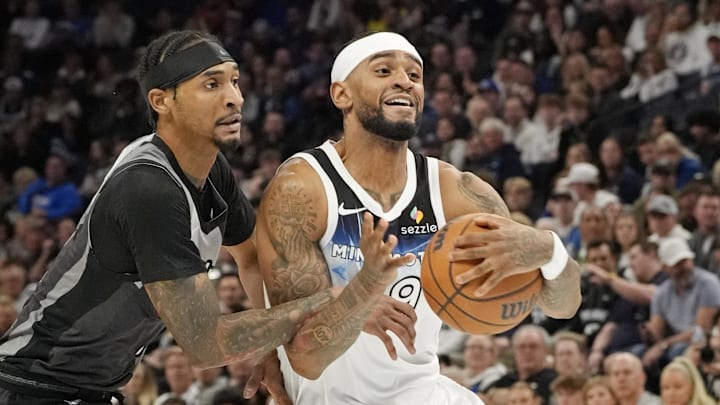 Apr 11, 2025; Minneapolis, Minnesota, USA; Minnesota Timberwolves forward Nickeil Alexander-Walker (9) works past Brooklyn Nets guard Keon Johnson (45) in the third quarter at Target Center. Mandatory Credit: Bruce Kluckhohn-Imagn Images Apr 11, 2025; Minneapolis, Minnesota, USA; Minnesota Timberwolves forward Nickeil Alexander-Walker (9) works past Brooklyn Nets guard Keon Johnson (45) in the third quarter at Target Center. Mandatory Credit: Bruce Kluckhohn-Imagn Images