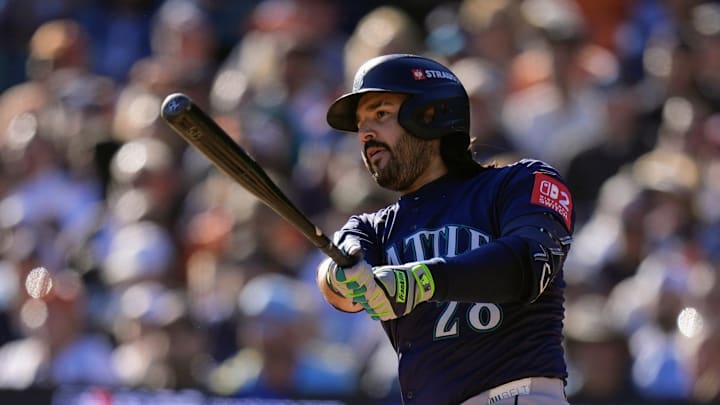 Mariners third baseman Eugenio Suarez bats a single against Tigers during the fourth inning of Game 4 of ALDS at Comerica Park in Detroit on Wednesday, Oct. 8, 2025.