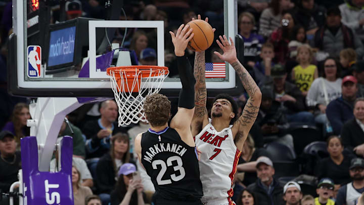 Jan 9, 2025; Salt Lake City, Utah, USA;  Miami Heat center Kel'el Ware (7) blocks the shot of Utah Jazz forward Lauri Markkanen (23) during the second quarter at Delta Center. Mandatory Credit: Chris Nicoll-Imagn Images