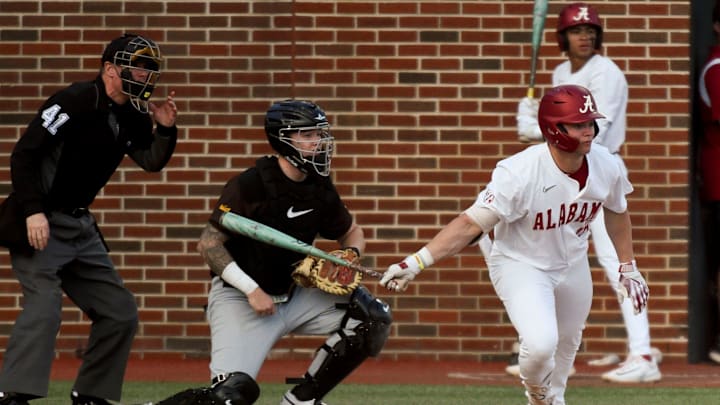 Feb 23, 2024; Tuscaloosa, Alabama, USA; Alabama batter Coleman Mizell runs out a ground ball during