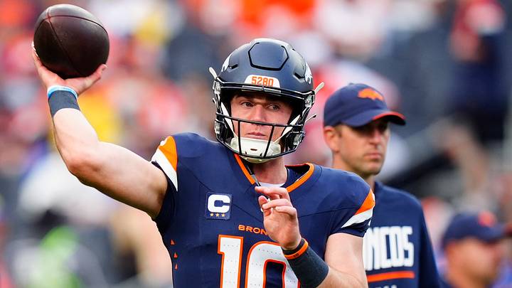 Sep 27, 2026; Denver, Colorado, USA;  Denver Broncos quarterback Bo Nix (10) warms up before the game against the Los Angeles Rams at Empower Field at Mile High.  Mandatory Credit: Ron Chenoy-Imagn Images