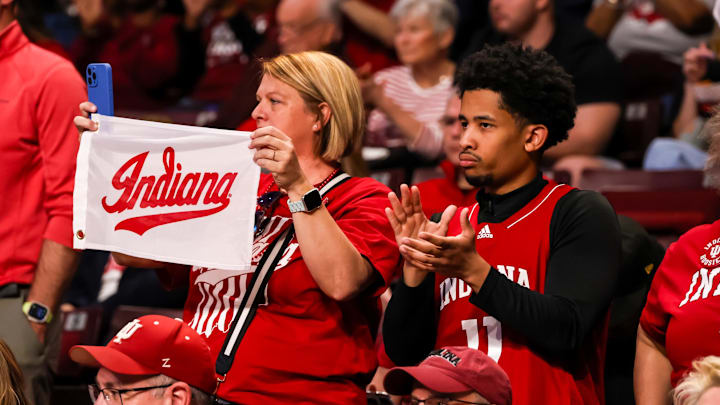 Mar 23, 2025; Columbia, South Carolina, USA; Indiana Hoosiers fans cheer before their game against the South Carolina Gamecocks at Colonial Life Arena. Mandatory Credit: Jeff Blake-Imagn Images