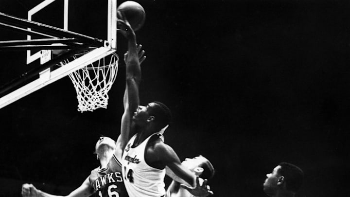 Mar 29, 1961; Los Angeles, CA, USA: FILE PHOTO; Los Angeles Lakers center Ray Felix (14) in action against St. Louis Hawks forward Cliff Hagan (16) during the 1961 playoffs at the L.A. Sports Arena. Mandatory Credit: Darryl Norenberg-Imagn Images Network