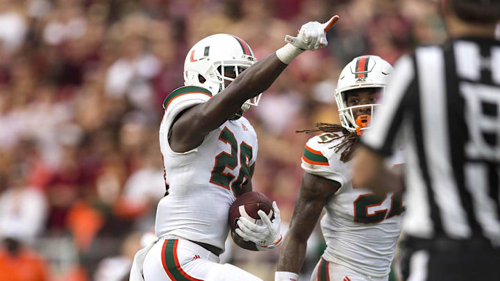 Oct 7, 2017; Tallahassee, FL, USA; Miami Hurricanes defensive back Michael Jackson (28) celebrates a second quarter interception at Doak Campbell Stadium. Mandatory Credit: Glenn Beil-Imagn Images