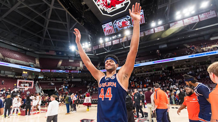 Jan 11, 2025; Columbia, South Carolina, USA;  Auburn Tigers center Dylan Cardwell (44) celebrates after defeating the South Carolina Gamecocks at Colonial Life Arena. Mandatory Credit: Jeff Blake-Imagn Images