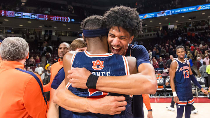 Jan 11, 2025; Columbia, South Carolina, USA;  Auburn Tigers guard Denver Jones (2) and guard Chad Baker-Mazara (10) celebrate after defeating the South Carolina Gamecocks at Colonial Life Arena. Mandatory Credit: Jeff Blake-Imagn Images