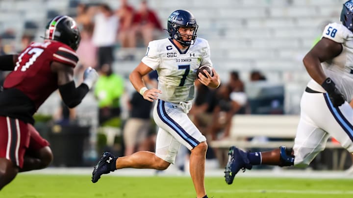 Aug 31, 2024; Columbia, South Carolina, USA; Old Dominion Monarchs quarterback Grant Wilson (7) scrambles against the South Carolina Gamecocks in the second half at Williams-Brice Stadium. Mandatory Credit: Jeff Blake-Imagn Images