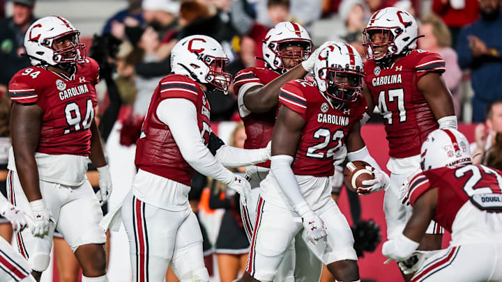 South Carolina football linebacker Bam Martin-Scott celebrating with his teammates after an interception