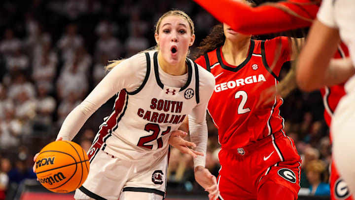 Feb 18, 2024; Columbia, South Carolina, USA; South Carolina Gamecocks forward Chloe Kitts (21) drives against the Georgia Lady Bulldogs in the second half at Colonial Life Arena. Mandatory Credit: Jeff Blake-Imagn Images