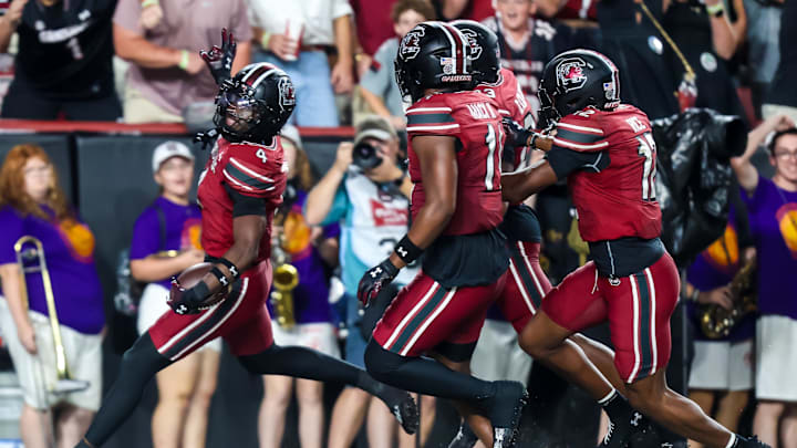 Sep 6, 2025; Columbia, South Carolina, USA; South Carolina Gamecocks defensive back Vicari Swain (4) celebrates his second punt return touchdown against the South Carolina State Bulldogs in the second quarter at Williams-Brice Stadium. Mandatory Credit: Jeff Blake-Imagn Images
