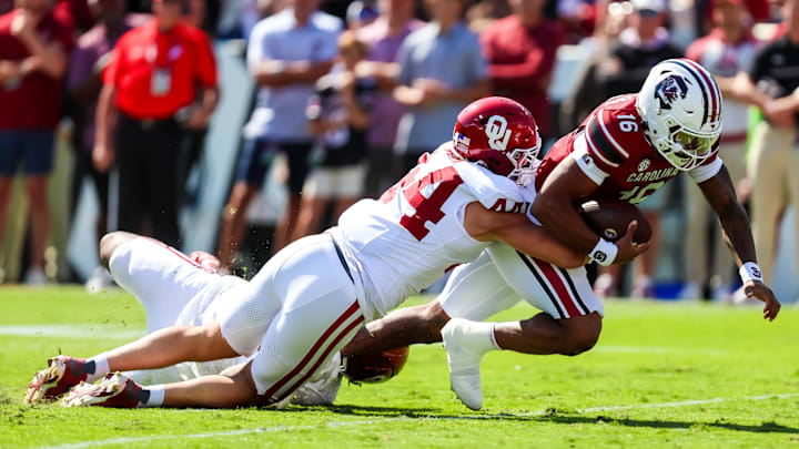 Oct 18, 2025; Columbia, South Carolina, USA; South Carolina Gamecocks quarterback Lanorris Sellers (16) is brought down on fourth and goal by Oklahoma Sooners defensive lineman Taylor Wein (44) in the first quarter at Williams-Brice Stadium. Mandatory Credit: Jeff Blake-Imagn Images