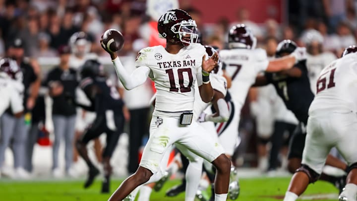 Nov 2, 2024; Columbia, South Carolina, USA; Texas A&M Aggies quarterback Marcel Reed (10) passes against the South Carolina Gamecocks in the first quarter at Williams-Brice Stadium. Mandatory Credit: Jeff Blake-Imagn Images