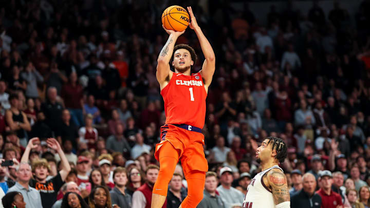 Dec 17, 2024; Columbia, South Carolina, USA; Clemson Tigers guard Chase Hunter (1) makes a three point basket with 0.3 seconds left in regulation to send the game to overtime in the second half of South Carolina’s 91-88 win at Colonial Life Arena. Mandatory Credit: Jeff Blake-Imagn Images