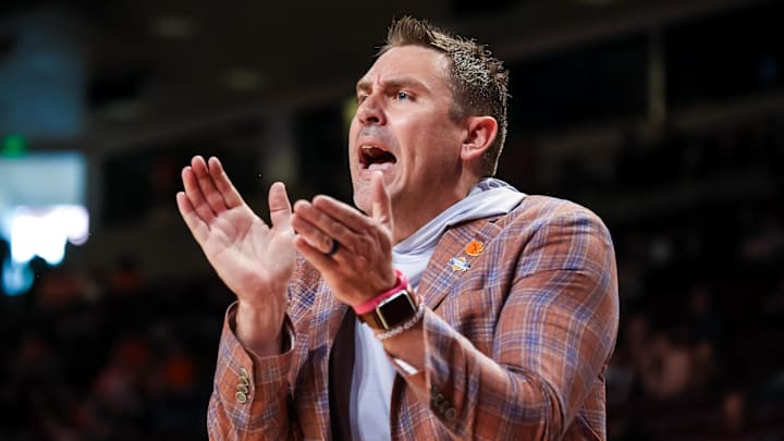 Mar 21, 2026; Columbia, South Carolina, USA; Clemson Tigers head coach Shawn Poppie directs his team against the USC Trojans in the first half at Colonial Life Arena. Mandatory Credit: Jeff Blake-Imagn Images
