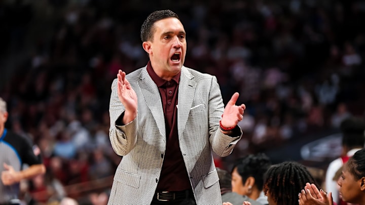 Jan 7, 2024; Columbia, South Carolina, USA; Mississippi State Bulldogs head coach Sam Purcell celebrates a play against the South Carolina Gamecocks in the first half at Colonial Life Arena. Mandatory Credit: Jeff Blake-Imagn Images