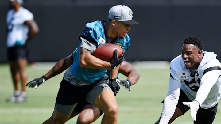 Jacksonville Jaguars running back Jalen Jackson (36) and linebacker Ventrell Miller (51) Monday, June 3, 2024 at EverBankStadium's Miller Electric Center in Jacksonville, Fla.