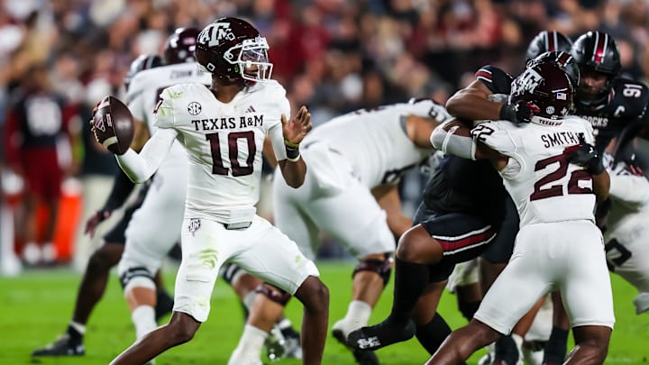 Nov 2, 2024; Columbia, South Carolina, USA; Texas A&M Aggies quarterback Marcel Reed (10) passes against the South Carolina Gamecocks in the second quarter at Williams-Brice Stadium. Mandatory Credit: Jeff Blake-Imagn Images Nov 2, 2024; Columbia, South Carolina, USA; Texas A&M Aggies quarterback Marcel Reed (10) passes against the South Carolina Gamecocks in the second quarter at Williams-Brice Stadium. Mandatory Credit: Jeff Blake-Imagn Images
