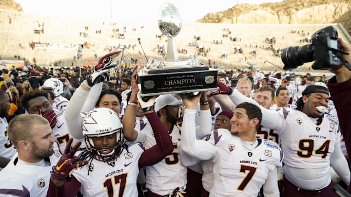 Dec 27, 2014; El Paso, TX, USA; Arizona State players hold up the Hyundai Sun Bowl Trophy after winning the 2014 Sun Bowl at Sun Bowl Stadium. The Sun Devils defeated the Blue Devils 36-31. Mandatory Credit: Ivan Pierre Aguirre-Imagn Images Dec 27, 2014; El Paso, TX, USA; Arizona State players hold up the Hyundai Sun Bowl Trophy after winning the 2014 Sun Bowl at Sun Bowl Stadium. The Sun Devils defeated the Blue Devils 36-31. Mandatory Credit: Ivan Pierre Aguirre-Imagn Images