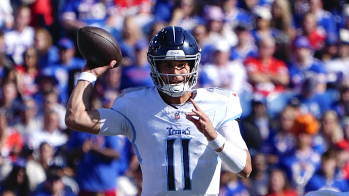 Oct 20, 2024; Orchard Park, New York, USA; Tennessee Titans quarterback Mason Rudolph (11) throws the ball against the Buffalo Bills during the first half at Highmark Stadium. Mandatory Credit: Gregory Fisher-Imagn Images