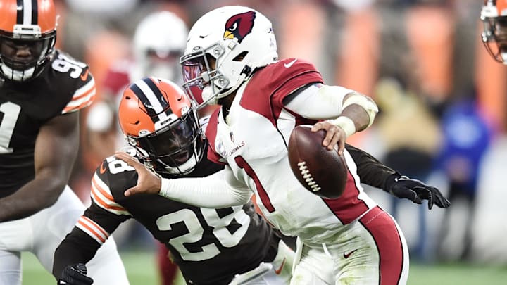 Oct 17, 2021; Cleveland, Ohio, USA; Arizona Cardinals quarterback Kyler Murray (1) scrambles from Cleveland Browns outside linebacker Jeremiah Owusu-Koramoah (28) during the second half at FirstEnergy Stadium. Mandatory Credit: Ken Blaze-Imagn Images