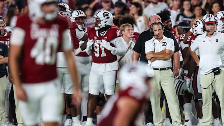 Sep 21, 2024; Columbia, South Carolina, USA;
South Carolina Gamecocks head coach Shane Beamer watches as place kicker Alex Herrera (40) lines up for a point after against the Akron Zips the first quarter at Williams-Brice Stadium. Mandatory Credit: Jeff Blake-Imagn Images Sep 21, 2024; Columbia, South Carolina, USA;
South Carolina Gamecocks head coach Shane Beamer watches as place kicker Alex Herrera (40) lines up for a point after against the Akron Zips the first quarter at Williams-Brice Stadium. Mandatory Credit: Jeff Blake-Imagn Images