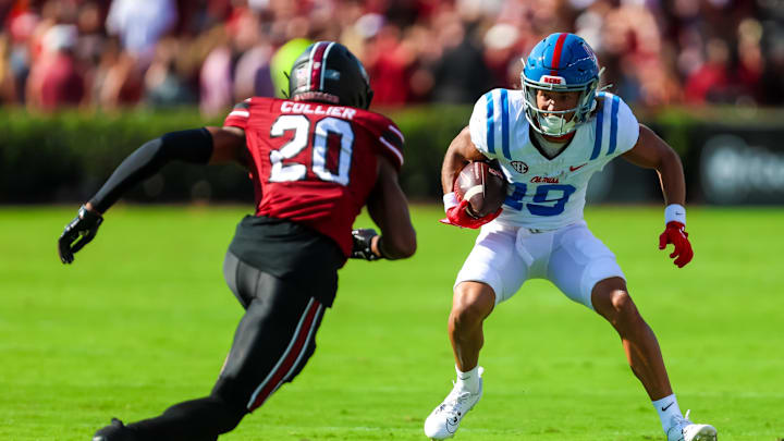Oct 5, 2024; Columbia, South Carolina, USA; Mississippi Rebels wide receiver Cayden Lee (19) attempts to get around South Carolina Gamecocks defensive back Judge Collier (20) in the first quarter at Williams-Brice Stadium. Mandatory Credit: Jeff Blake-Imagn Images