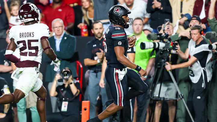Nov 2, 2024; Columbia, South Carolina, USA; South Carolina Gamecocks quarterback LaNorris Sellers (16) rushes for a touchdown against the Texas A&M Aggies in the first quarter at Williams-Brice Stadium. Mandatory Credit: Jeff Blake-Imagn Images Nov 2, 2024; Columbia, South Carolina, USA; South Carolina Gamecocks quarterback LaNorris Sellers (16) rushes for a touchdown against the Texas A&M Aggies in the first quarter at Williams-Brice Stadium. Mandatory Credit: Jeff Blake-Imagn Images