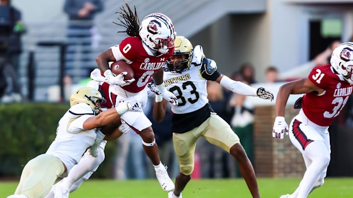Nov 23, 2024; Columbia, South Carolina, USA; South Carolina Gamecocks running back Juju McDowell (0) runs the ball against the Wofford Terriers in the first quarter at Williams-Brice Stadium. Mandatory Credit: Jeff Blake-Imagn Images Nov 23, 2024; Columbia, South Carolina, USA; South Carolina Gamecocks running back Juju McDowell (0) runs the ball against the Wofford Terriers in the first quarter at Williams-Brice Stadium. Mandatory Credit: Jeff Blake-Imagn Images