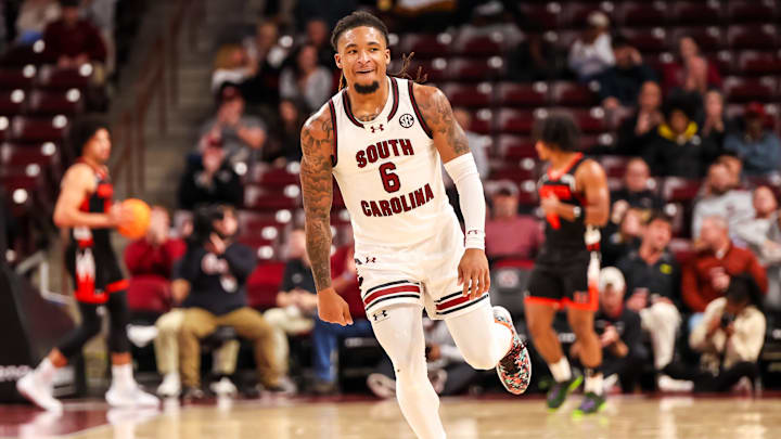 Nov 21, 2024; Columbia, South Carolina, USA; South Carolina Gamecocks guard Jamarii Thomas (6) celebrates a three point basket against the Mercer Bears in the second half at Colonial Life Arena. Mandatory Credit: Jeff Blake-Imagn Images