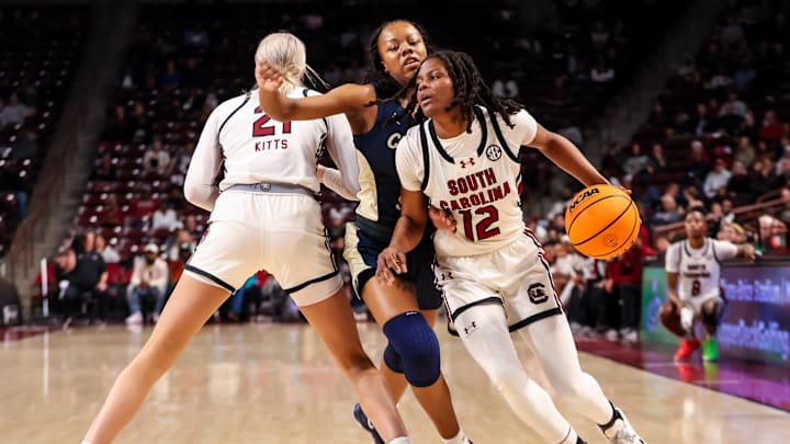 Dec 19, 2024; Columbia, South Carolina, USA; South Carolina Gamecocks guard MiLaysia Fulwiley (12) drives around Charleston Southern Buccaneers guard Alaina Nettles (15) in the first half at Colonial Life Arena. Mandatory Credit: Jeff Blake-Imagn Images Dec 19, 2024; Columbia, South Carolina, USA; South Carolina Gamecocks guard MiLaysia Fulwiley (12) drives around Charleston Southern Buccaneers guard Alaina Nettles (15) in the first half at Colonial Life Arena. Mandatory Credit: Jeff Blake-Imagn Images