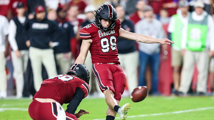 Oct 22, 2022; Columbia, South Carolina, USA; South Carolina Gamecocks place kicker Mitch Jeter (98) makes a field goal against the Texas A&M Aggies in the first quarter at Williams-Brice Stadium. Mandatory Credit: Jeff Blake-Imagn Images