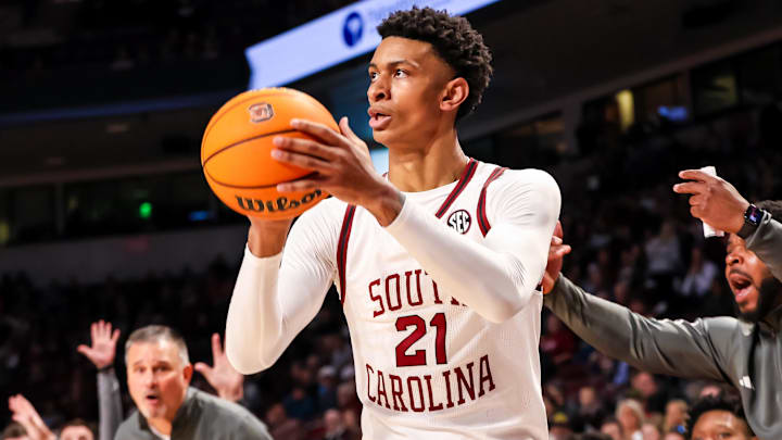 Jan 25, 2025; Columbia, South Carolina, USA; South Carolina Gamecocks guard Arden Conyers (21) attempts a three point basket against the Mississippi State Bulldogs in the first half at Colonial Life Arena. Mandatory Credit: Jeff Blake-Imagn Images