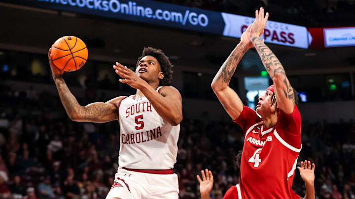 Mar 1, 2025; Columbia, South Carolina, USA; South Carolina Gamecocks forward Nick Pringle (5) drives past Arkansas Razorbacks forward Trevon Brazile (4) in the first half at Colonial Life Arena. Mandatory Credit: Jeff Blake-Imagn Images Mar 1, 2025; Columbia, South Carolina, USA; South Carolina Gamecocks forward Nick Pringle (5) drives past Arkansas Razorbacks forward Trevon Brazile (4) in the first half at Colonial Life Arena. Mandatory Credit: Jeff Blake-Imagn Images