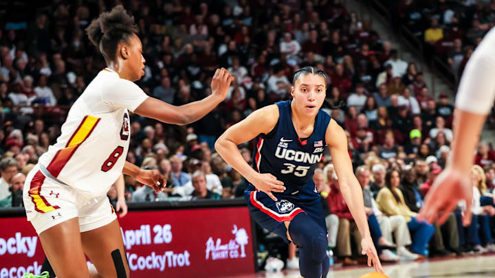 Feb 16, 2025; Columbia, South Carolina, USA; UConn Huskies guard Azzi Fudd (35) drives against the South Carolina Gamecocks in the second half at Colonial Life Arena. Mandatory Credit: Jeff Blake-Imagn Images