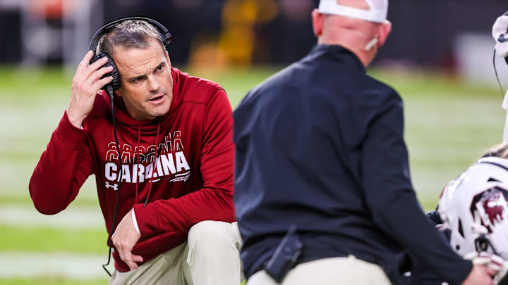 Nov 16, 2024; Columbia, South Carolina, USA; South Carolina Gamecocks head coach Shane Beamer checks on an injured player against the Missouri Tigers in the second quarter at Williams-Brice Stadium. Mandatory Credit: Jeff Blake-Imagn Images Nov 16, 2024; Columbia, South Carolina, USA; South Carolina Gamecocks head coach Shane Beamer checks on an injured player against the Missouri Tigers in the second quarter at Williams-Brice Stadium. Mandatory Credit: Jeff Blake-Imagn Images