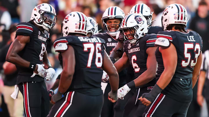 Nov 16, 2024; Columbia, South Carolina, USA; South Carolina Gamecocks tight end Joshua Simon (6) celebrates a touchdown against the Missouri Tigers in the second quarter at Williams-Brice Stadium. Mandatory Credit: Jeff Blake-Imagn Images