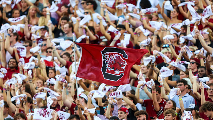 Aug 31, 2024; Columbia, South Carolina, USA; South Carolina Gamecocks wave a flag in the first half against the Old Dominion Monarchs at Williams-Brice Stadium. Mandatory Credit: Jeff Blake-Imagn Images Aug 31, 2024; Columbia, South Carolina, USA; South Carolina Gamecocks wave a flag in the first half against the Old Dominion Monarchs at Williams-Brice Stadium. Mandatory Credit: Jeff Blake-Imagn Images