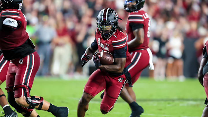 Sep 6, 2025; Columbia, South Carolina, USA; South Carolina Gamecocks running back Rahsul Faison (1) rushed against the South Carolina State Bulldogs in the second quarter at Williams-Brice Stadium. Mandatory Credit: Jeff Blake-Imagn Images