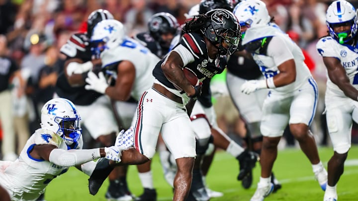 Sep 27, 2025; Columbia, South Carolina, USA; South Carolina Gamecocks running back Rahsul Faison (1) rushes for a touchdown against the Kentucky Wildcats in the first quarter at Williams-Brice Stadium. Mandatory Credit: Jeff Blake-Imagn Images