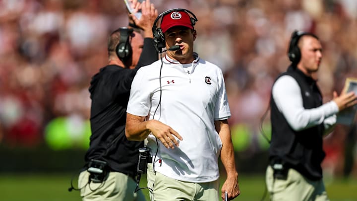 Oct 18, 2025; Columbia, South Carolina, USA; South Carolina Gamecocks head coach Shane Beamer directs his team against the Oklahoma Sooners in the second quarter at Williams-Brice Stadium. Mandatory Credit: Jeff Blake-Imagn Images