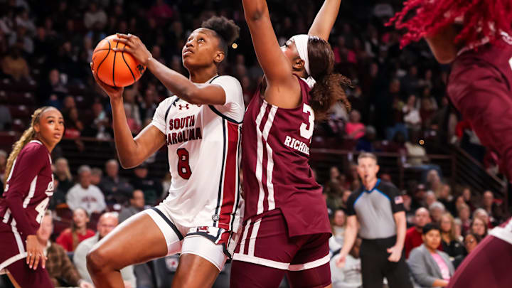 Feb 5, 2026; Columbia, South Carolina, USA; South Carolina Gamecocks forward Joyce Edwards (8) drives past Mississippi State Bulldogs forward Kharyssa Richardson (33) in the first half at Colonial Life Arena. Mandatory Credit: Jeff Blake-Imagn Images