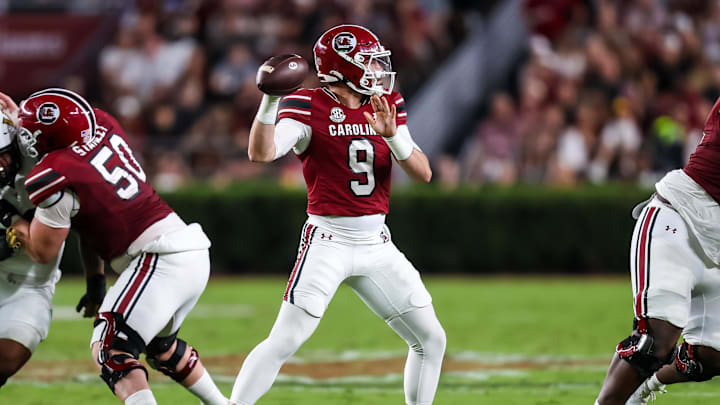 Sep 13, 2025; Columbia, South Carolina, USA; South Carolina Gamecocks wide receiver Luke Doty (9) passes against the Vanderbilt Commodores in the second quarter at Williams-Brice Stadium. Mandatory Credit: Jeff Blake-Imagn Images Sep 13, 2025; Columbia, South Carolina, USA; South Carolina Gamecocks wide receiver Luke Doty (9) passes against the Vanderbilt Commodores in the second quarter at Williams-Brice Stadium. Mandatory Credit: Jeff Blake-Imagn Images