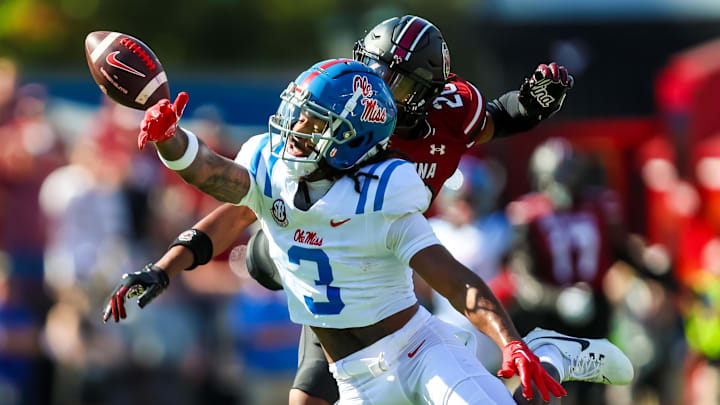 Oct 5, 2024; Columbia, South Carolina, USA; South Carolina Gamecocks defensive back Judge Collier (20) deflects a pass intended for Mississippi Rebels wide receiver Antwane Wells Jr. (3) in the first quarter at Williams-Brice Stadium. Mandatory 