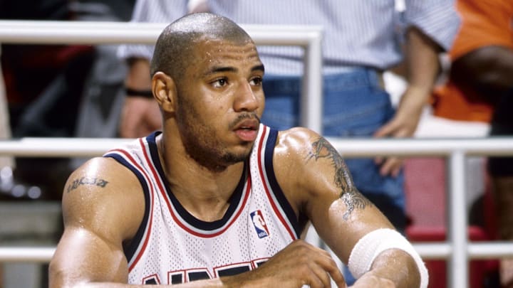 Unknown location, 2000; USA; FILE PHOTO; New Jersey Nets forward Kenyon Martin (6) sits on the bench during the 2000 season. Mandatory Credit: RVR Photos-Imagn Images