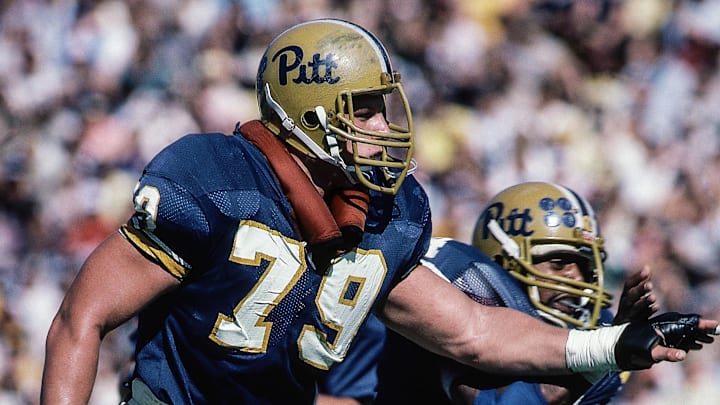 Oct 2, 1982, Pittsburgh, PA, USA; FILE PHOTO; Pittsburgh Panthers offensive lineman Bill Fralic (79) against the West Virginia Mountaineers at Pitt Stadium during the 1982 season. Mandatory Credit: Malcolm Emmons-Imagn Images