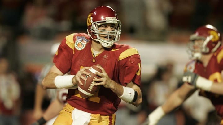 Jan 04, 2005; Miami, FL, USA; USC Trojans quarterback Matt Leinart in action during the 2005 Orange Bowl against the Oklahoma Sooners . Leinart, who threw 5 touchdowns, was named the game's MVP.
Mandatory Credit: Photo by Imagn Images (©) Copyright 2005 by Preston Mack